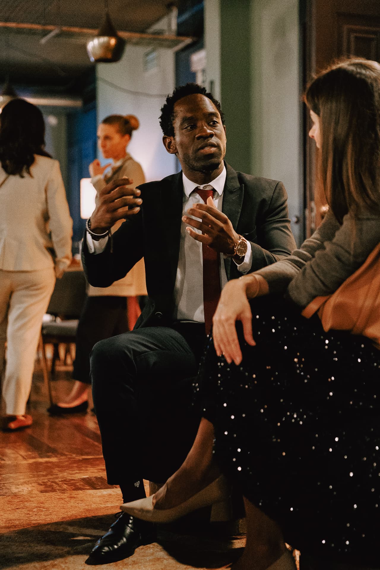 Steven Dossou in conversation at an investor gathering